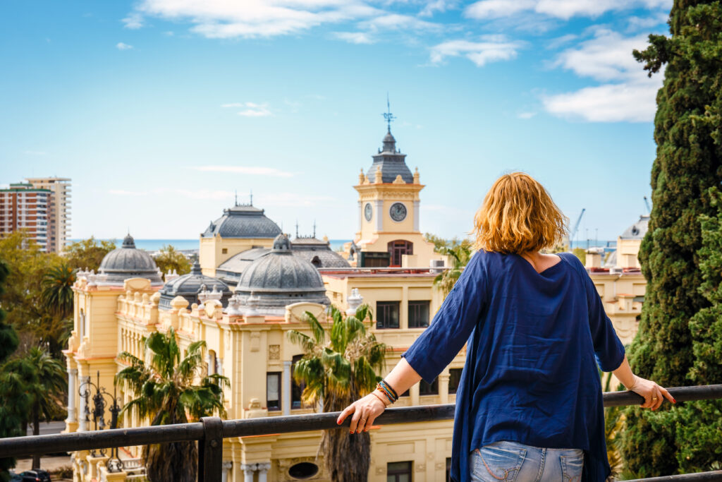 Malaga El limonar and La Malagueta residential neigbourhoods woman alone in front of sea 
