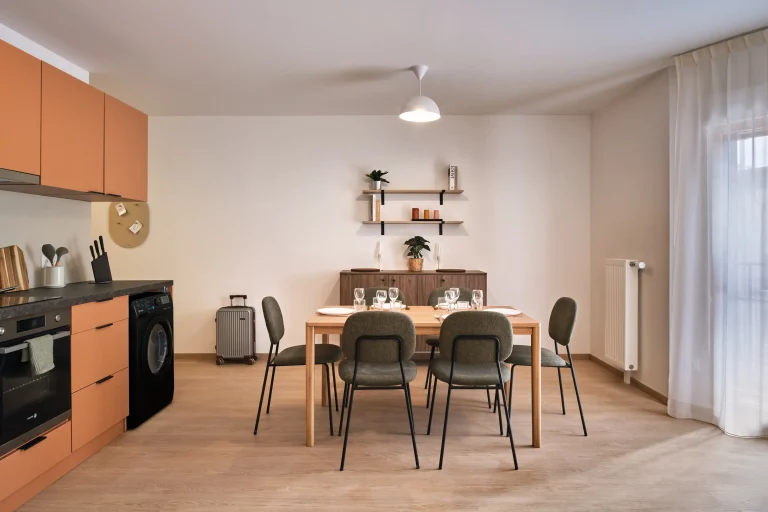 Shared kitchen and dining area in a shared apartment at Urban Campus Confluences
