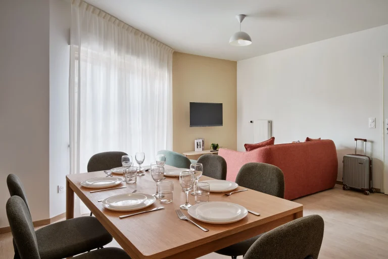 Living and dining area in a shared apartment at Urban Campus Confluences
