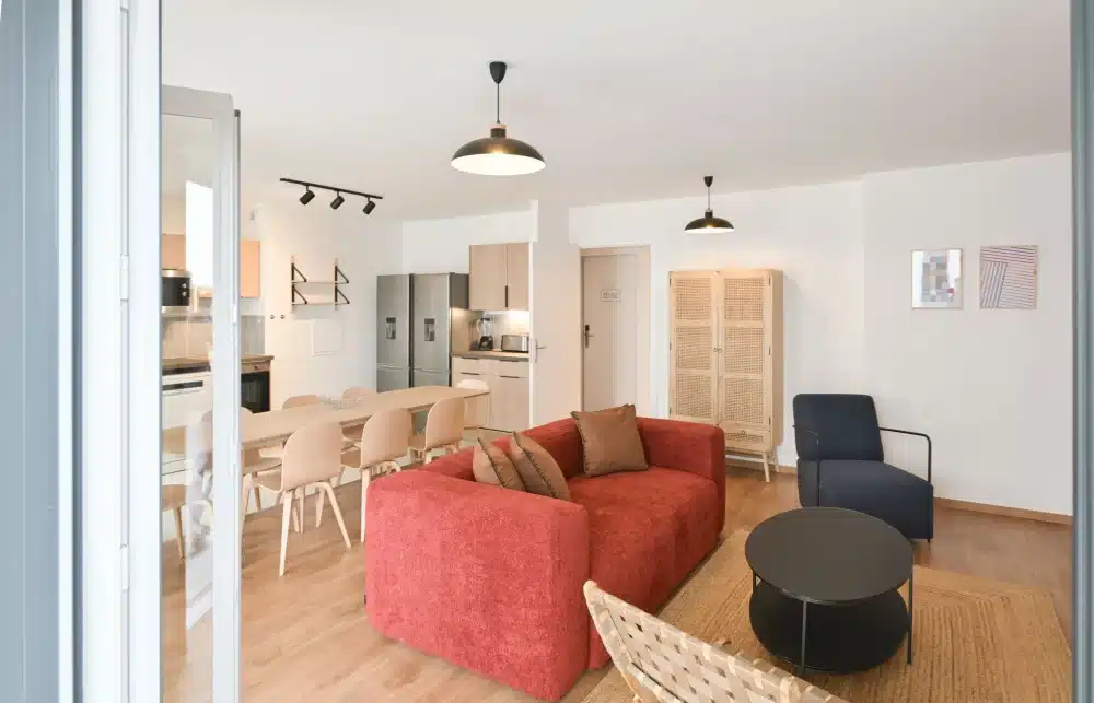 Living room and kitchen in an apartment at Urban Campus La Maillerie Coliving in Lille