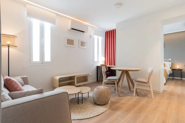 Living area at Urban Campus Madrid Atocha Coliving, desk nook and dining table