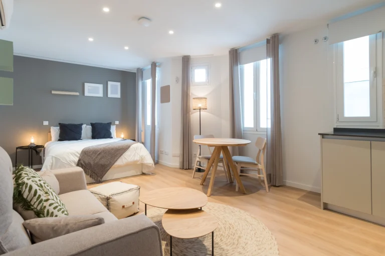 Studio at Urban Campus Madrid Atocha Coliving, bed, lounge and dining space
