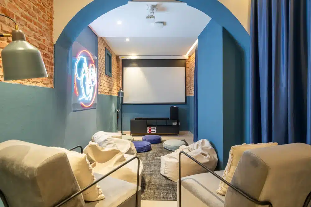 Cinema lounge at Urban Campus Atocha Madrid, cozy seating and big screen