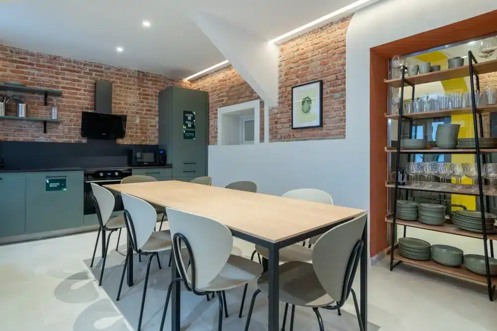 Shared kitchen at Urban Campus Atocha Madrid, communal dining space for residents