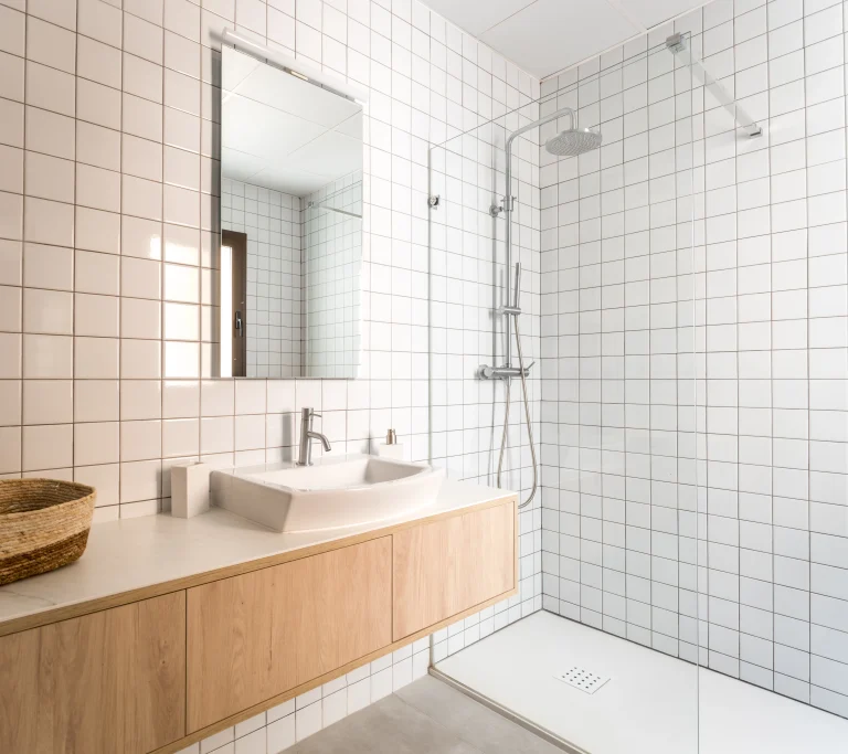 Bathroom at Urban Campus Malasaña Coliving in Madrid, walk-in shower and wooden vanity