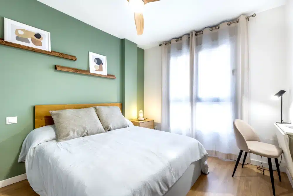 Bedroom at Urban Campus Casajara, Málaga coliving apartment, bed and reading corner