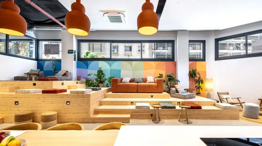 Common lounge at Urban Campus Casajara, Málaga coliving, tiered seating and sofa