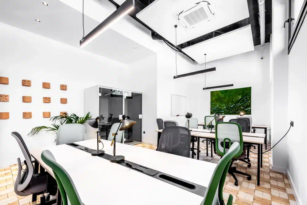 Coworking area at Urban Campus Casajara, Málaga coliving, shared desks and meeting pods
