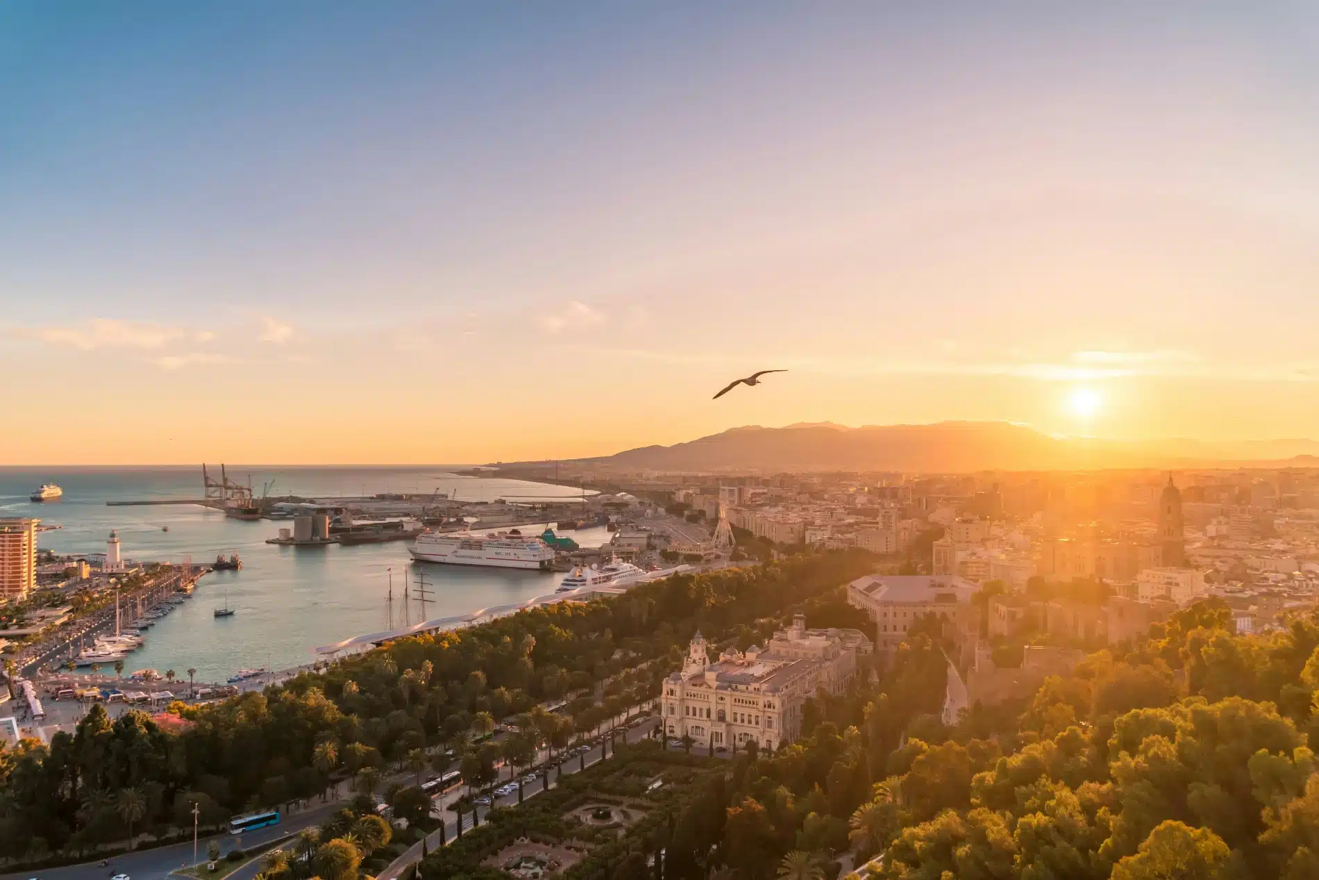 The city of Málaga and its port at sunset, home to Urban Campus