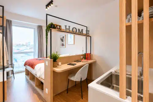 Furnished studio at Urban Campus Bauer residence in Saint-Ouen, double bed, desk and kitchenette