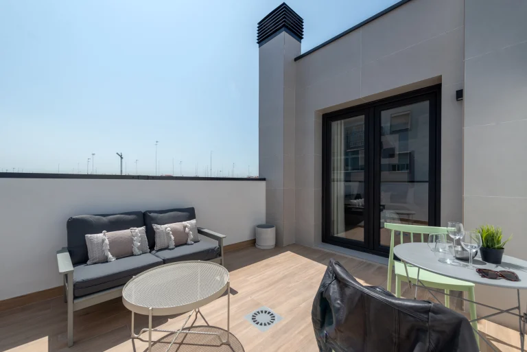 Private terrace at Urban Campus Ayora in Valencia, outdoor lounge and dining area