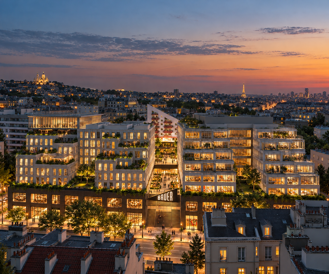 Vue aérienne de la résidence Urban Campus Bauer à Saint-Ouen au crépuscule, avec le Sacré-Cœur et la tour Eiffel