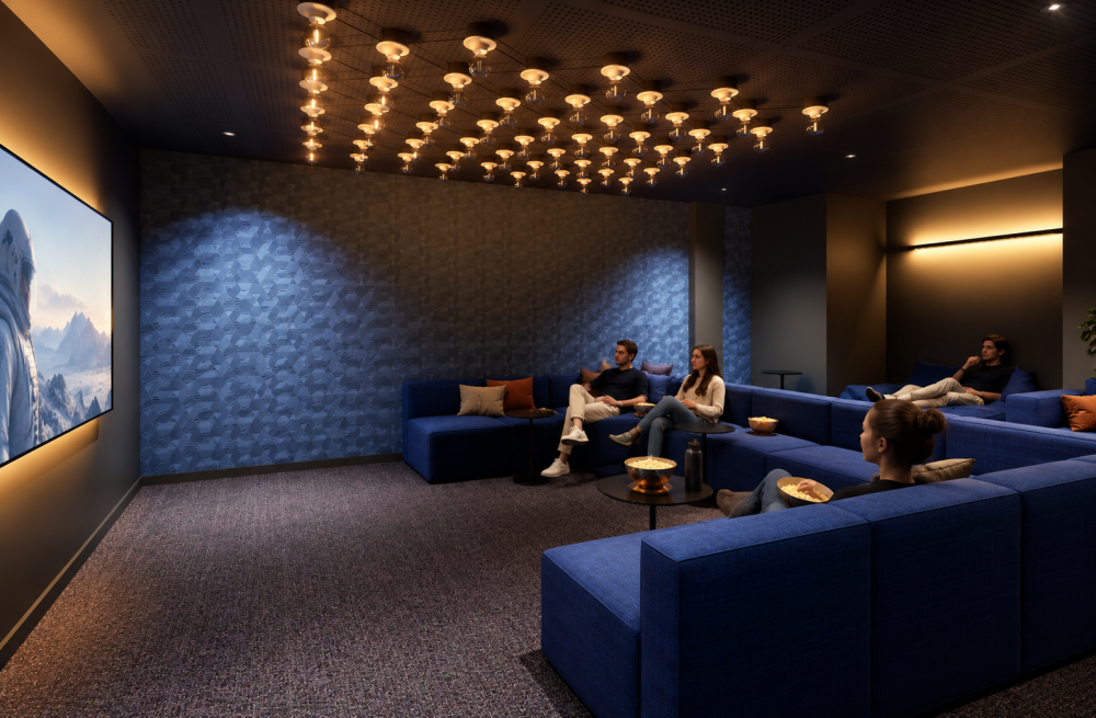 Cinema lounge at Urban Campus Bauer residence in Saint-Ouen, large screen and blue modular sofas