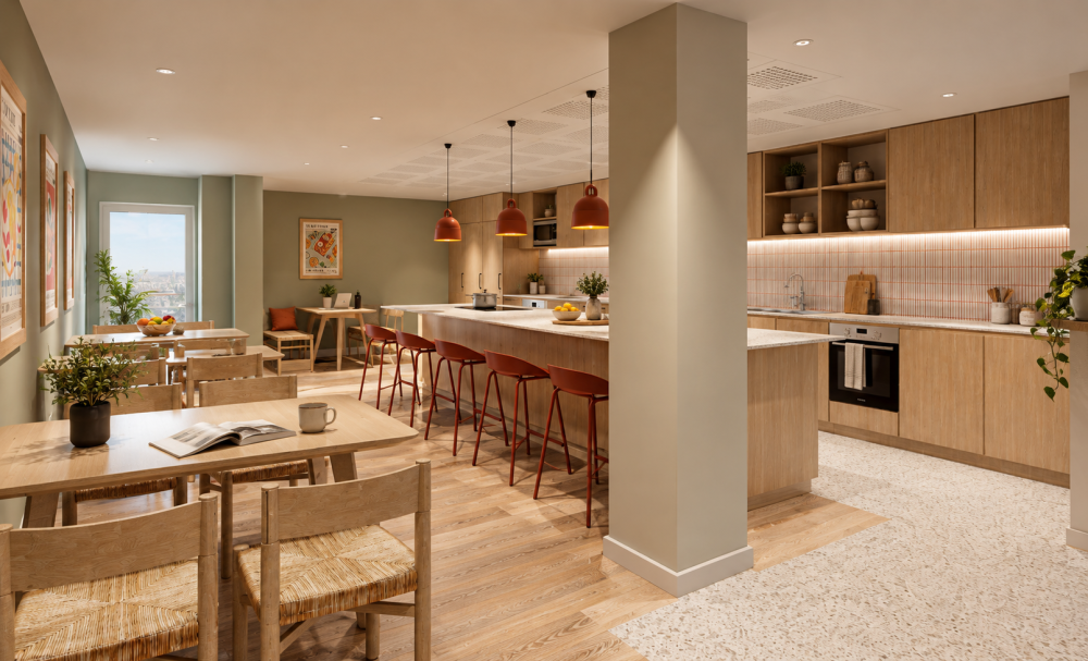 Shared kitchen at Urban Campus Bauer residence in Saint-Ouen, central island, bar stools and dining area